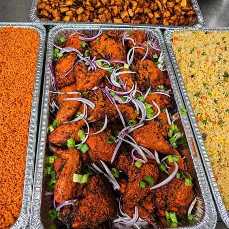 Party-size platter of grilled chicken and rice
