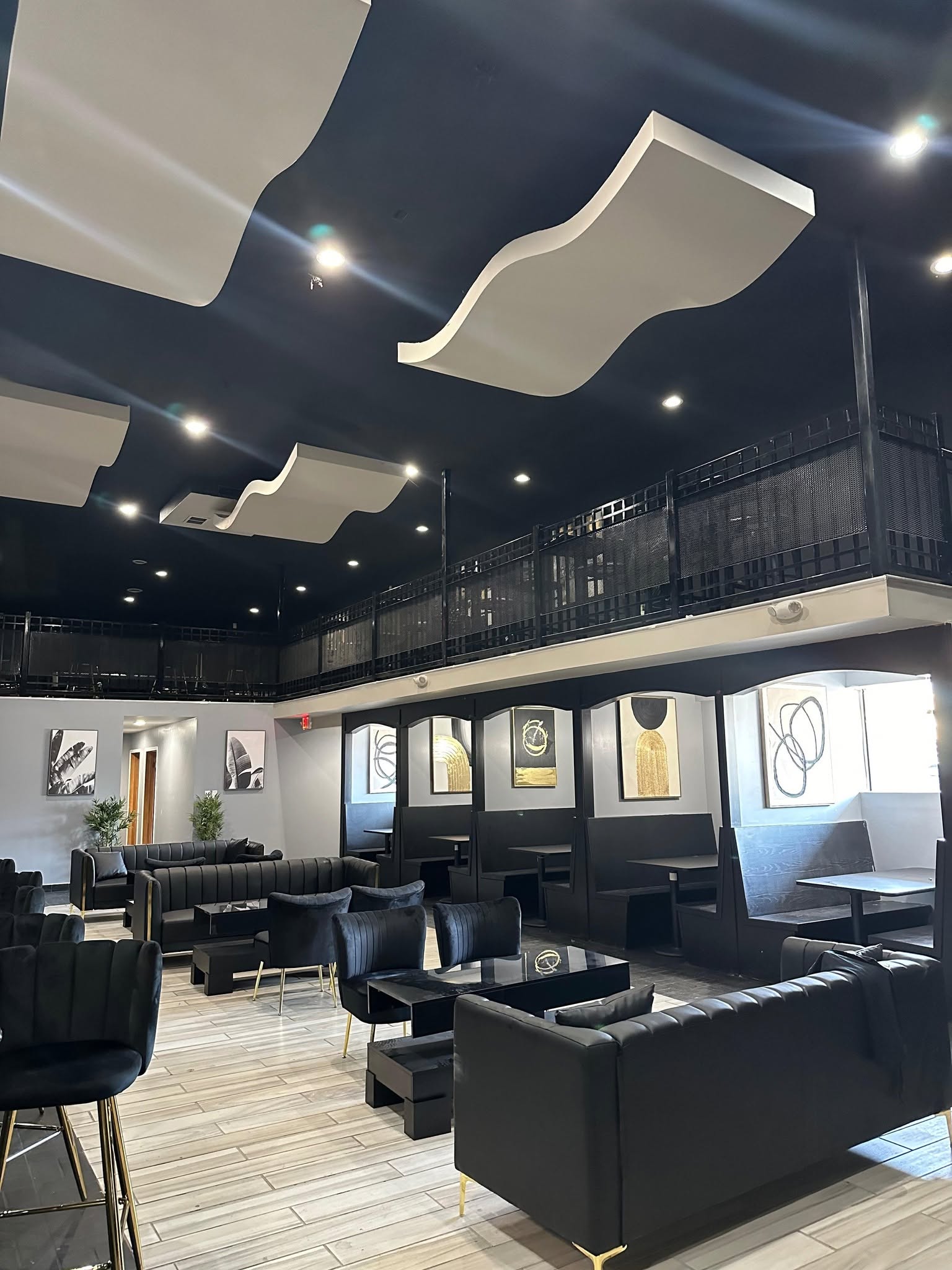 African Grill lounge with leather seating and a mezzanine level